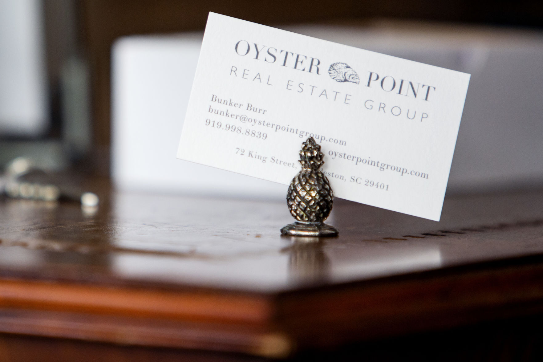 Oyster Point Real Estate business card